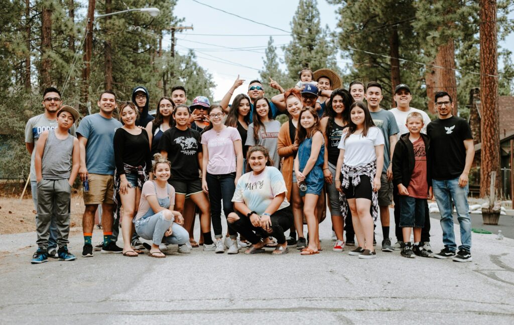 A group of travellers taking a photo together outdoors